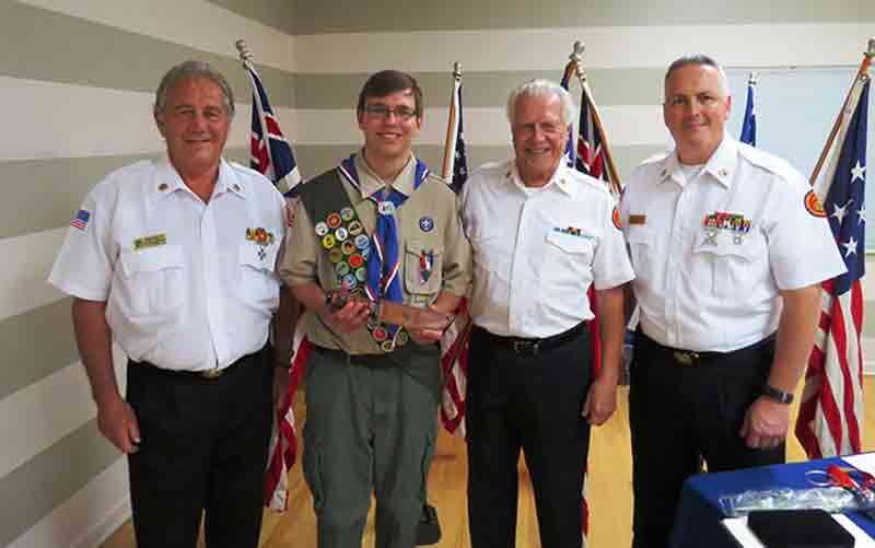 An Eagle Scout court of honor with scouts and detachment members